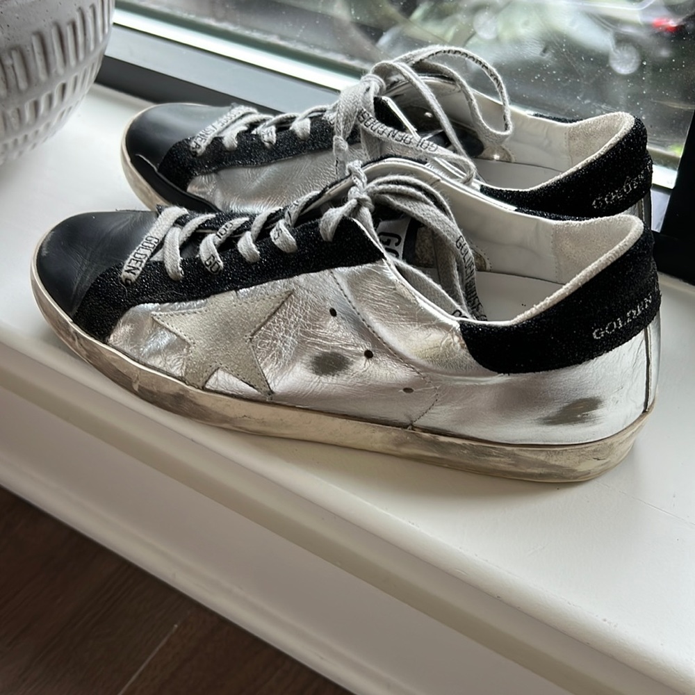 Gorgeous Silver Golden Goose in a size 38. worn them maybe 10 times. Like new.